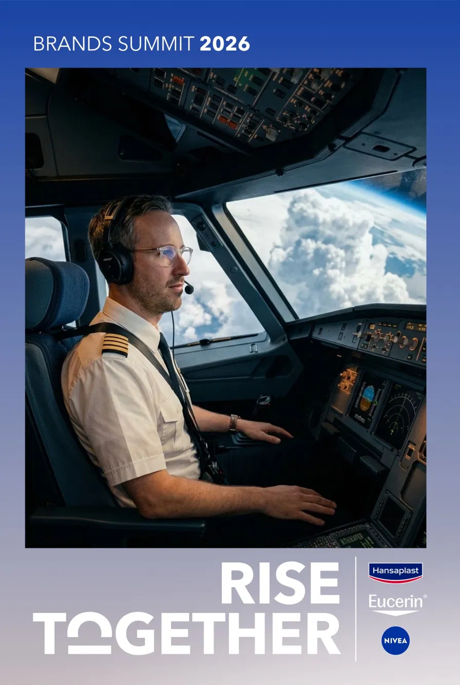 AI-Welt für den Beiersdorf Brands Summit 2026: Gast im Flugzeug-Cockpit